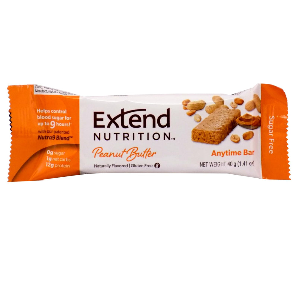 Extend Bar Peanut Butter Sugar-Free Protein Bar beside a glass of water