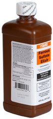 Ferrous Sulfate Elixir pour spout over a glass, convenient dosing for daily iron.