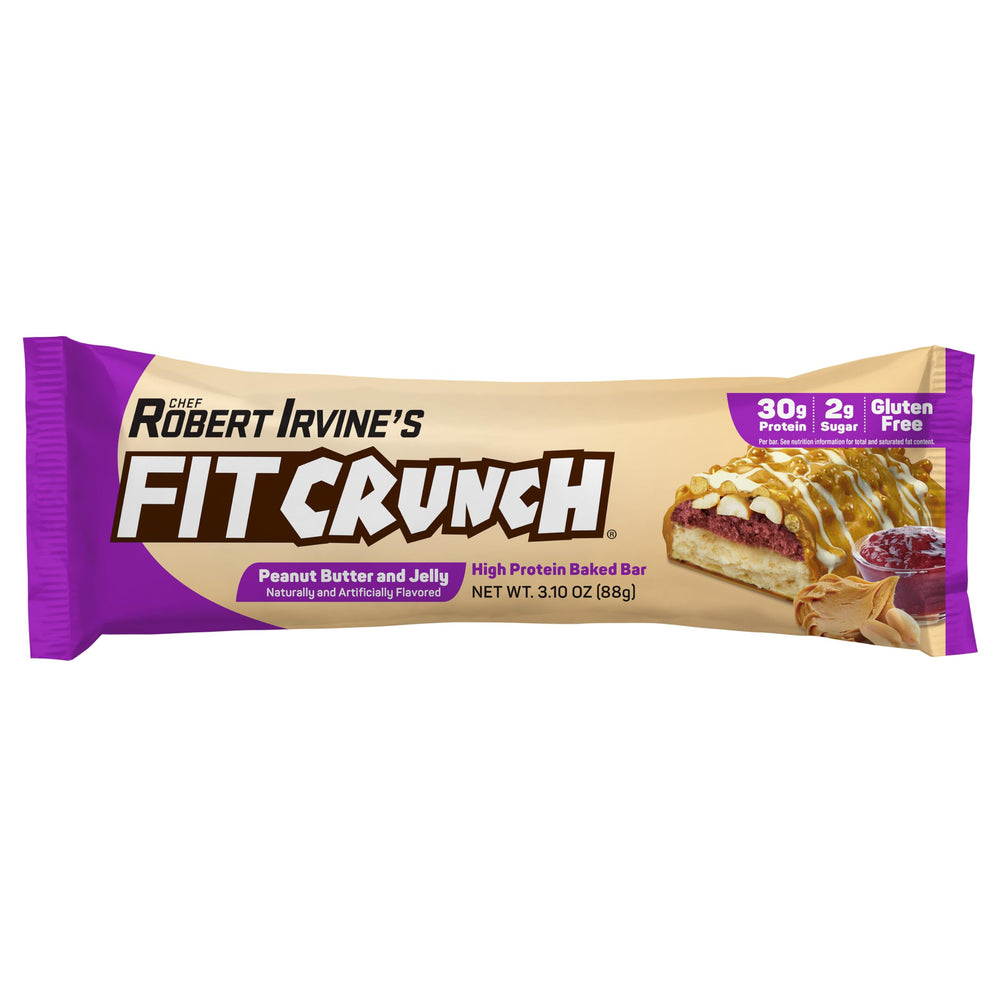 FITCRUNCH PB&J bar sliced to reveal multi-layer cake structure.