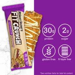 FITCRUNCH 6-layer baked bar on kitchen counter, gluten-free snack option.