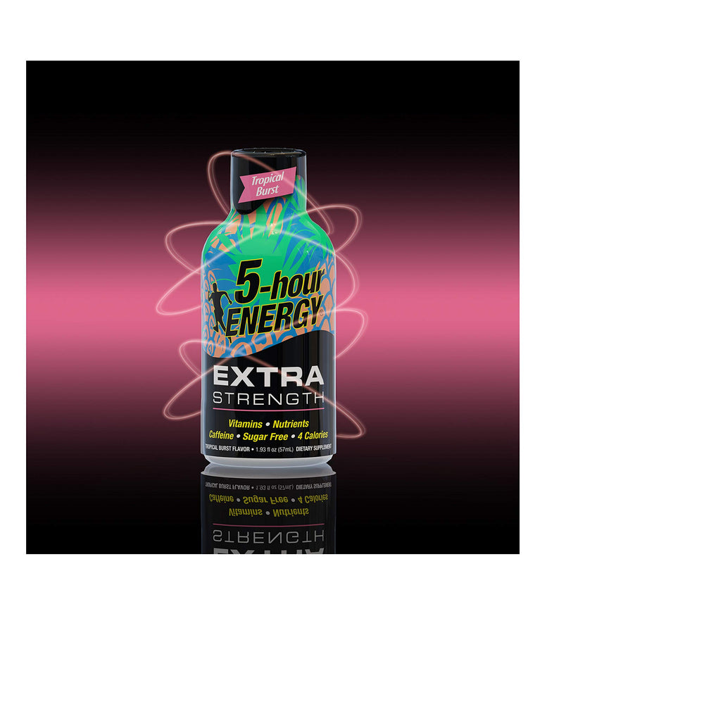 Five-hour Energy Extra Strength shot in hand showing portable convenience