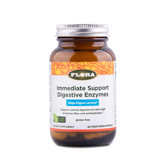 Flora Enzyme Blend bottle front shows vegan, gluten-free label for digestion support.