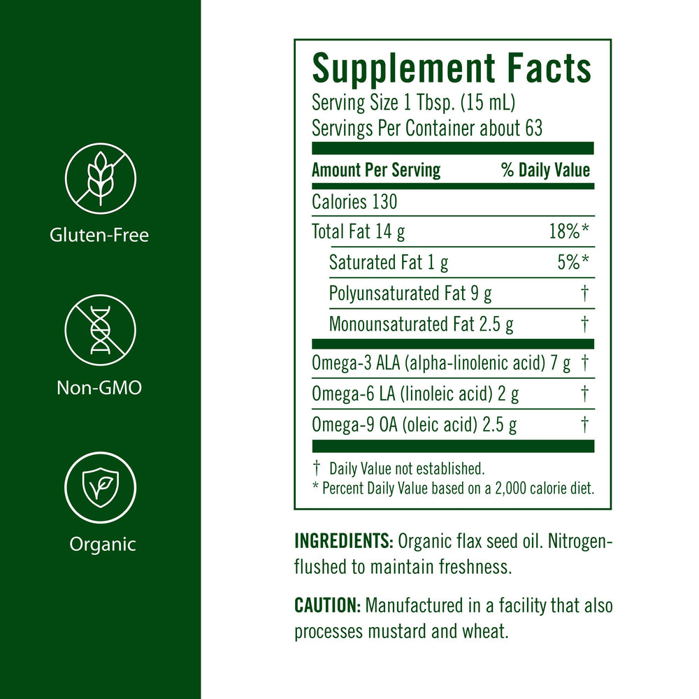 Flora Flax Oil pour captured mid-pour, versatile finishing oil for meals.