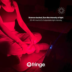 Fringe Red Light Panel in-use over leg muscles for post-workout recovery.