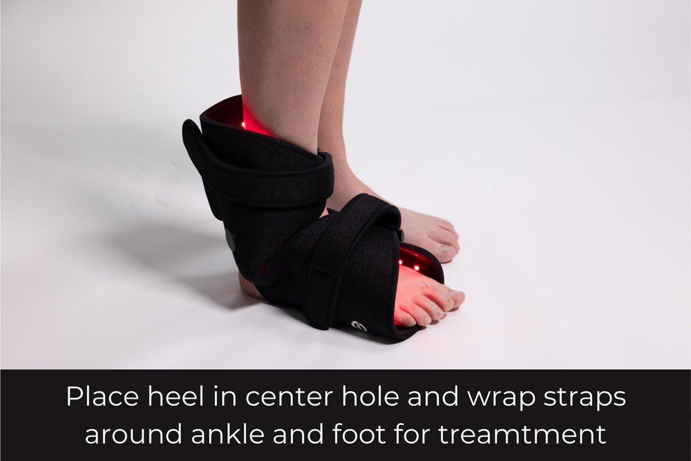 Fringe red light wrap on foot for post-workout recovery and comfort.