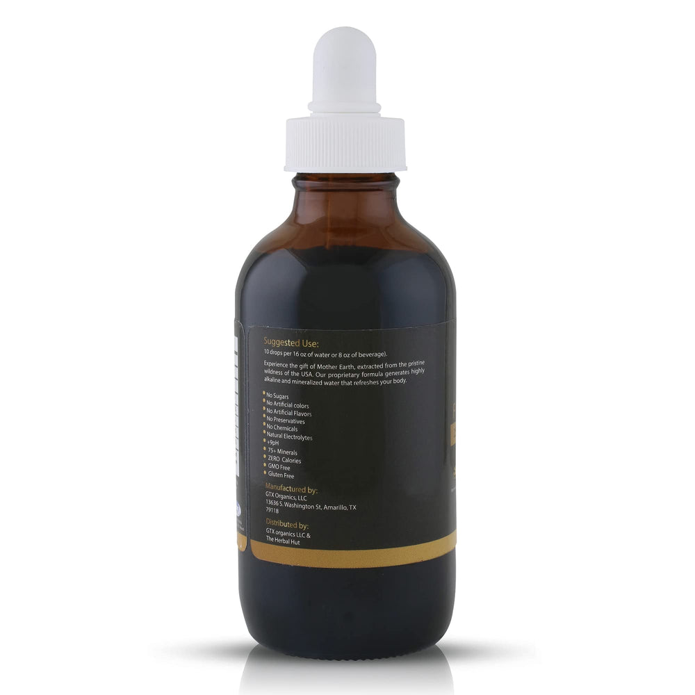 Fulvika Trace Mineral Drops being poured for mineral-rich beverages