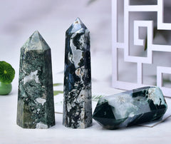 FZBHRO green crystal point close-up shows vivid banding ideal for calming rituals.
