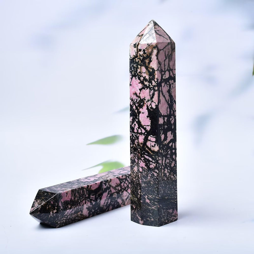 FZBHRO Rhodonite geode tower a striking centerpiece for calm balanced spaces.