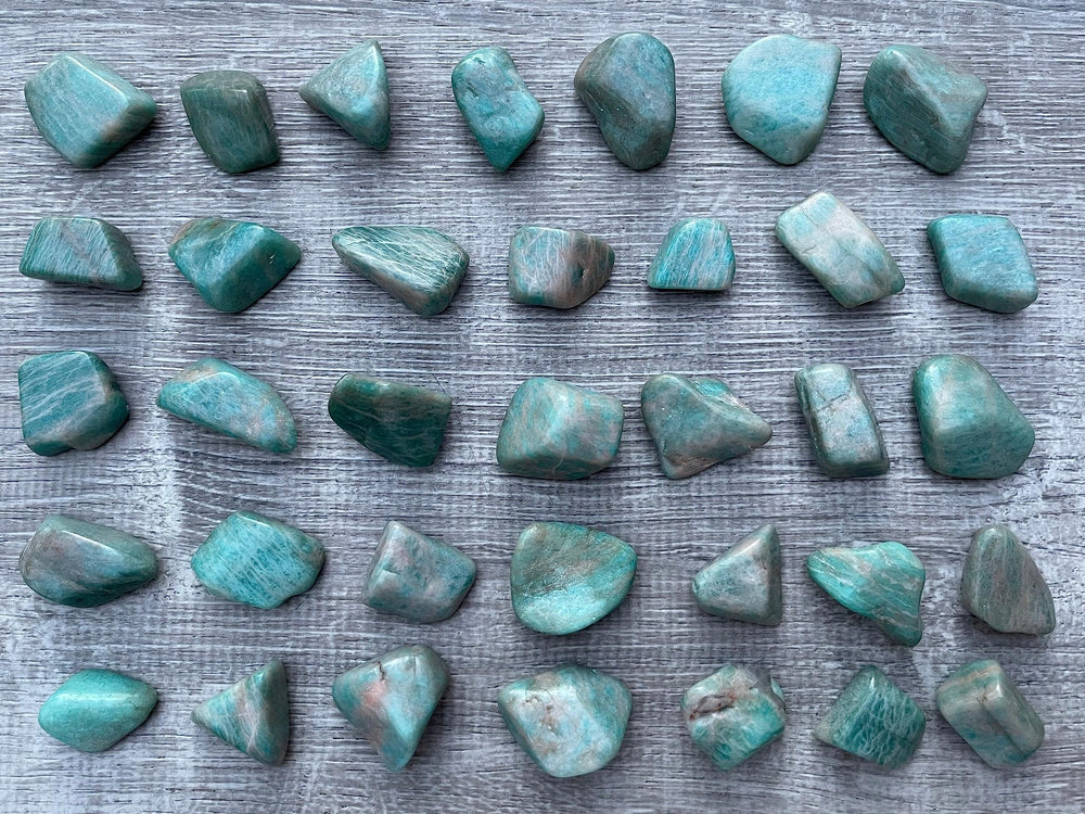 GAF Treasures polished amazonite stones reflecting natural variety and patterns.