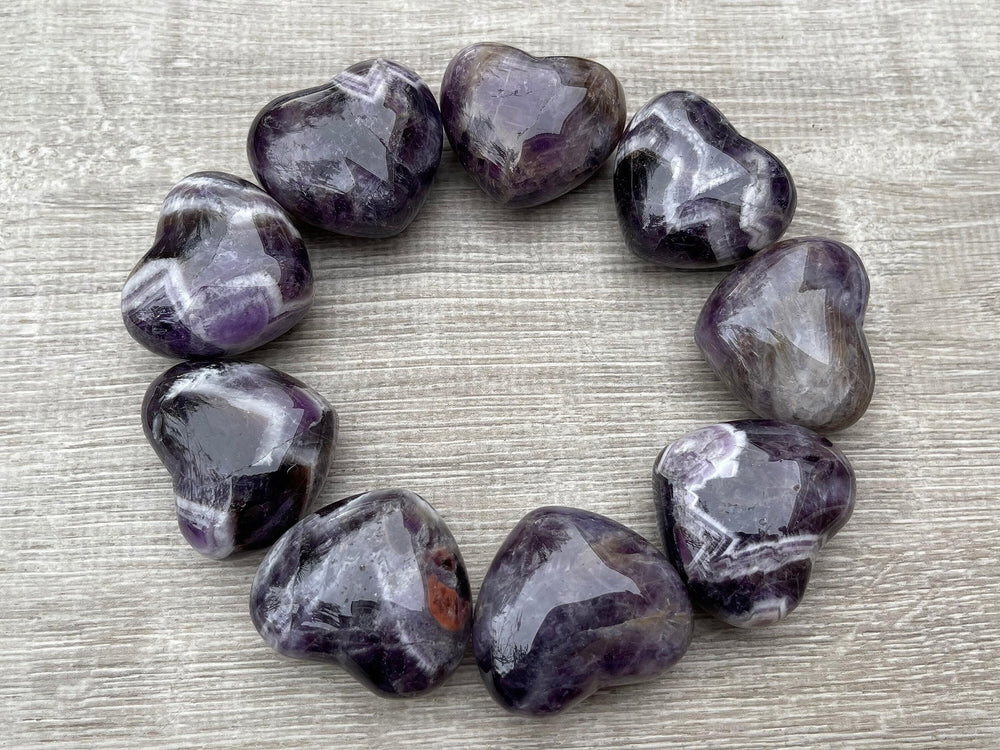 GAF Treasures Chevron Amethyst Worry Stone in hand to ease daily stress.