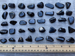GAF TREASURES Shungite stones per pound with natural variation in color.