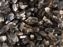 GAF TREASURES Smoky Quartz Point earthy tones complement natural decor and energy-focused spaces