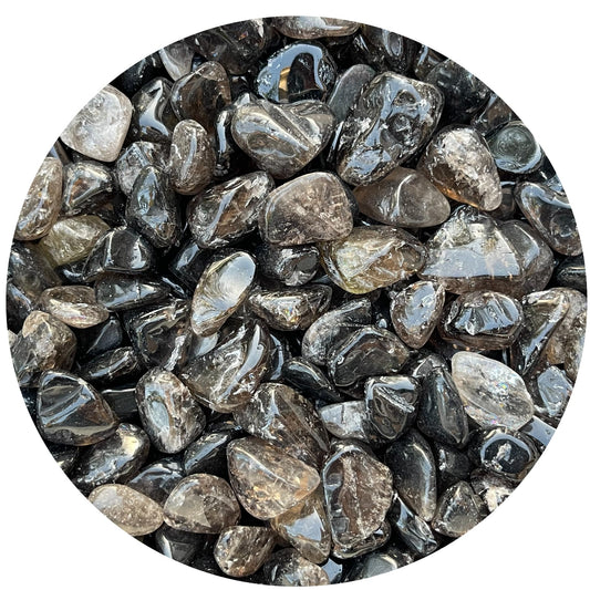 GAF Treasures smoky quartz tumbled stones close-up for meditation and balance.