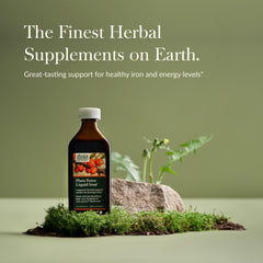 Gaia Herbs Plant Force Liquid Iron pouring into a spoon for easy dosing