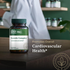 Olive leaf pictured with Gaia Herbs PRO Systolic Complex capsules