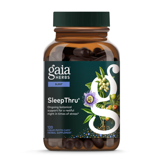 Gaia Herbs SleepThru bottle on a dresser, supporting calm evenings and restful nights.