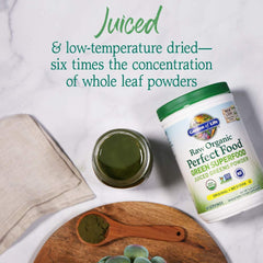 Garden of Life Super Greens powder scoop for a measured serving.