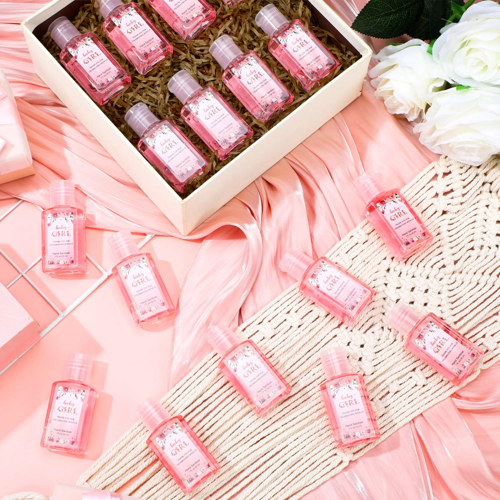Gejoy baby girl shower sanitizer with pink label, keeps guests clean on the go.