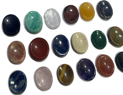 GEMSCITE worry stone held in hand for tactile relaxation and focus.
