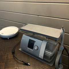 Generic Dust-reducing design elevates CPAP to minimize dust exposure
