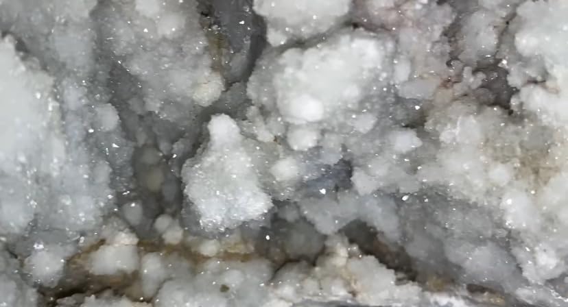 Generic Okenite Druzy Crystal Cluster glows softly for meditation spaces.