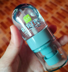 Travel-size Ririko Sweet Caramel Body Mist held in hand