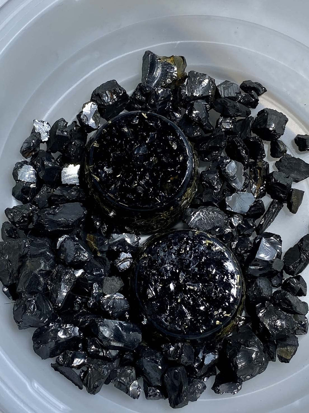 Generic Shungite Elite Noble tower buster closeup of base inlay suggests tactile energy feel.