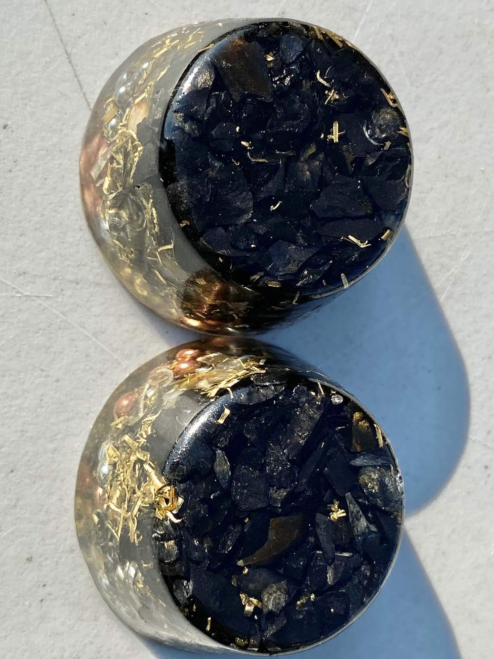 Generic Shungite Elite Noble tower buster in garden for positive energy dynamics.