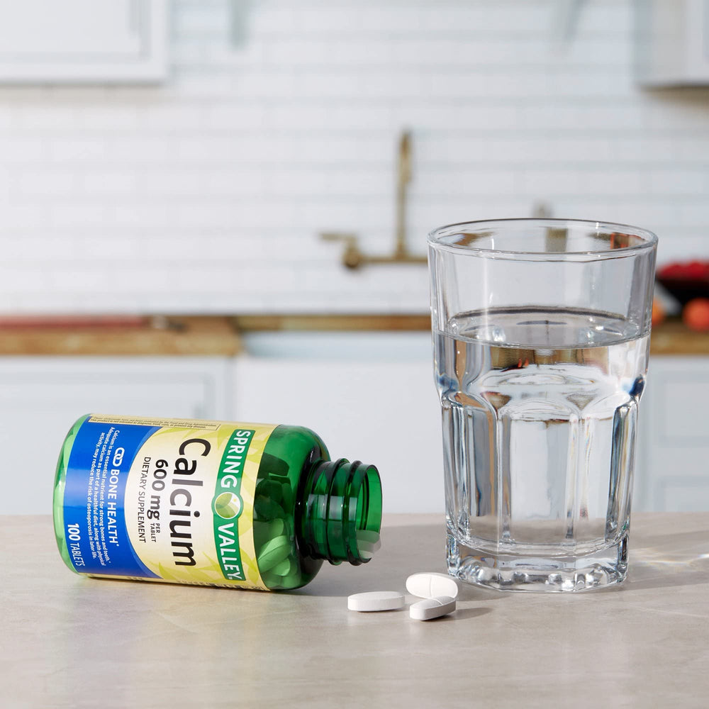 Three-bottle bundle of Generic Spring Valley Calcium 600mg on a clean surface.