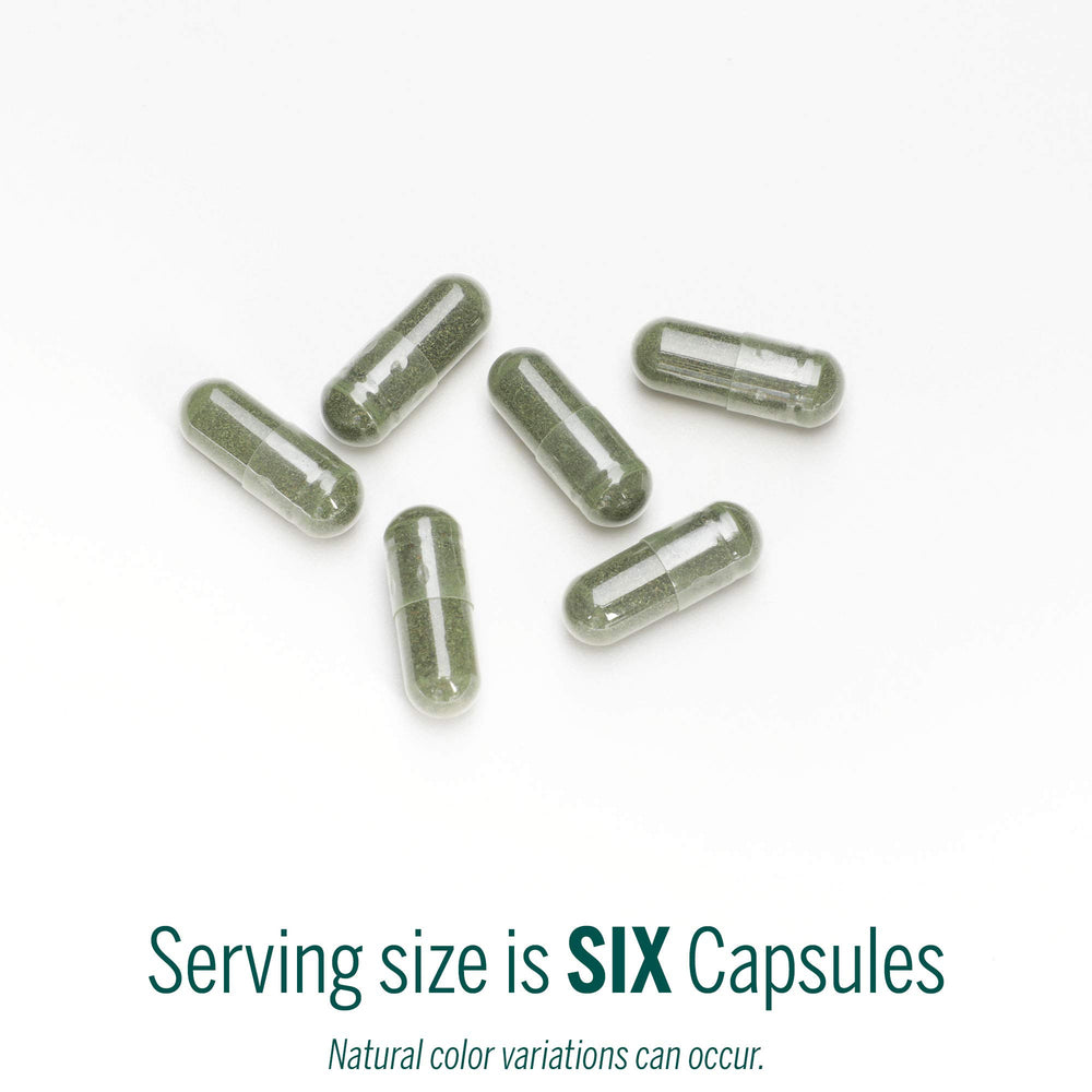 Genestra Phyto Greens capsules close-up revealing microalgae nutrients