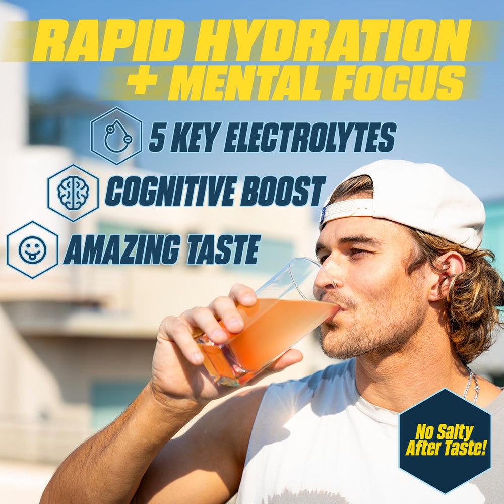 G Fuel Electrolytes Orange Oasis pour into glass signaling instant hydration and focus.