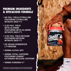 GHOST Legend All Out Strawbango powder being mixed for an energetic pre-workout session.