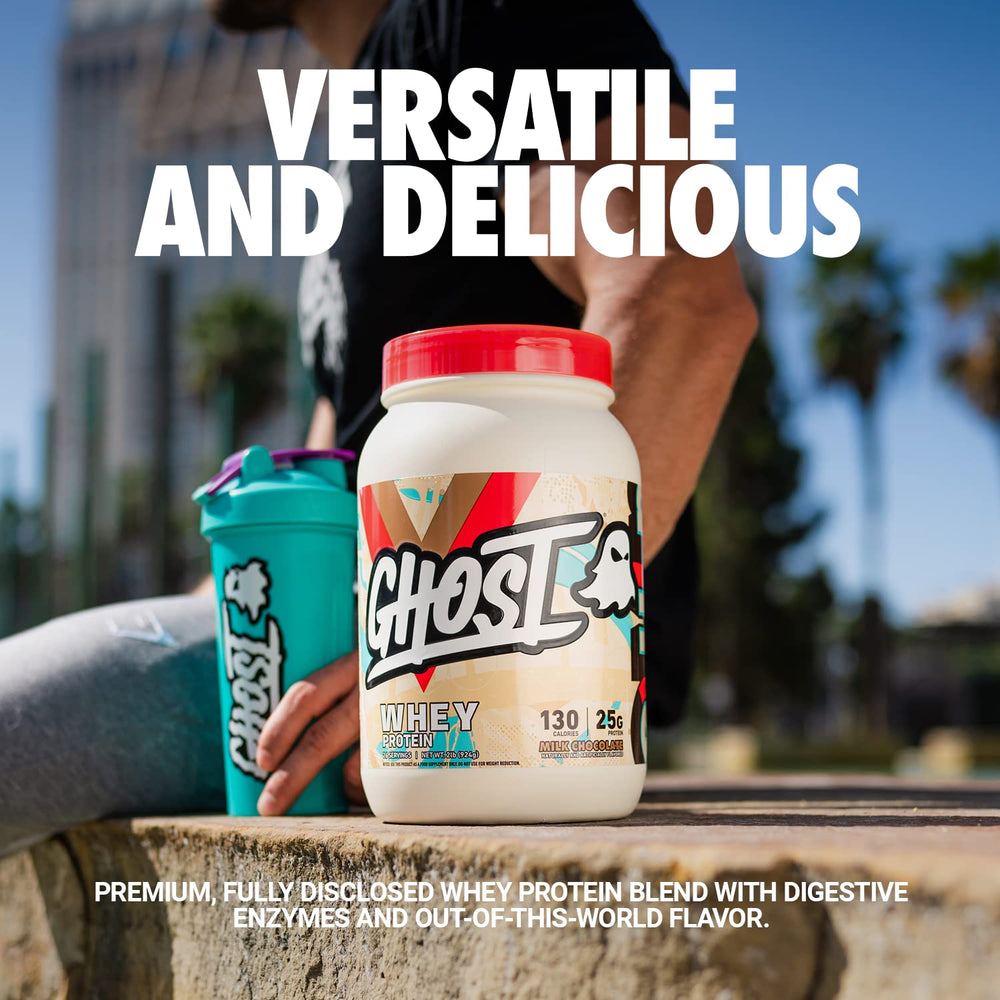 Ghost Whey Milk Chocolate scoop beside powder ideal for a quick protein shake.