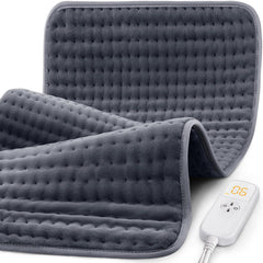 Glamigee extra-large heating pad on a couch providing full back warmth.