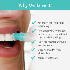 Toothbrush with gel applied, targeting visible teeth for even whitening.
