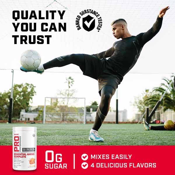 Athlete drinking during training with GNC Essential Amino Complete