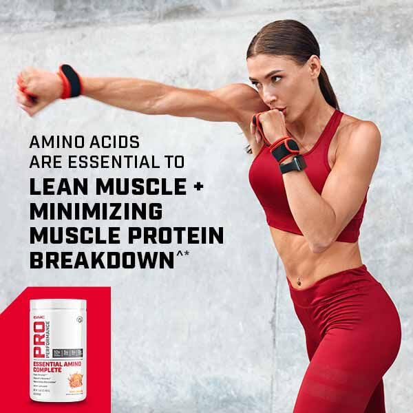 Scoop beside powder to indicate serving size for GNC Essential Amino Complete