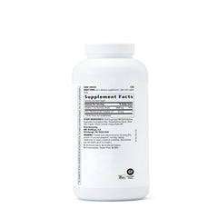 GNC Vitamin C 1000mg caplets close-up highlights texture for easy swallowing and immune support.