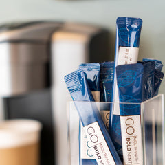 Go Mouthwash Bold Mint bottle mockup showcasing premium travel toiletries for guest bathrooms.