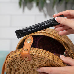 Go Mouthwash clear liquid packets showcase non-staining travel formula.