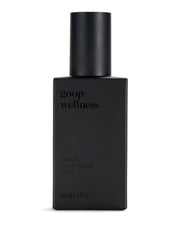 goop Wellness Sex Oil bottle being poured for a mess-free at-home massage.
