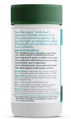 Green Foods chlorella powder label closeup emphasizes organic, vegan, non-GMO credentials.