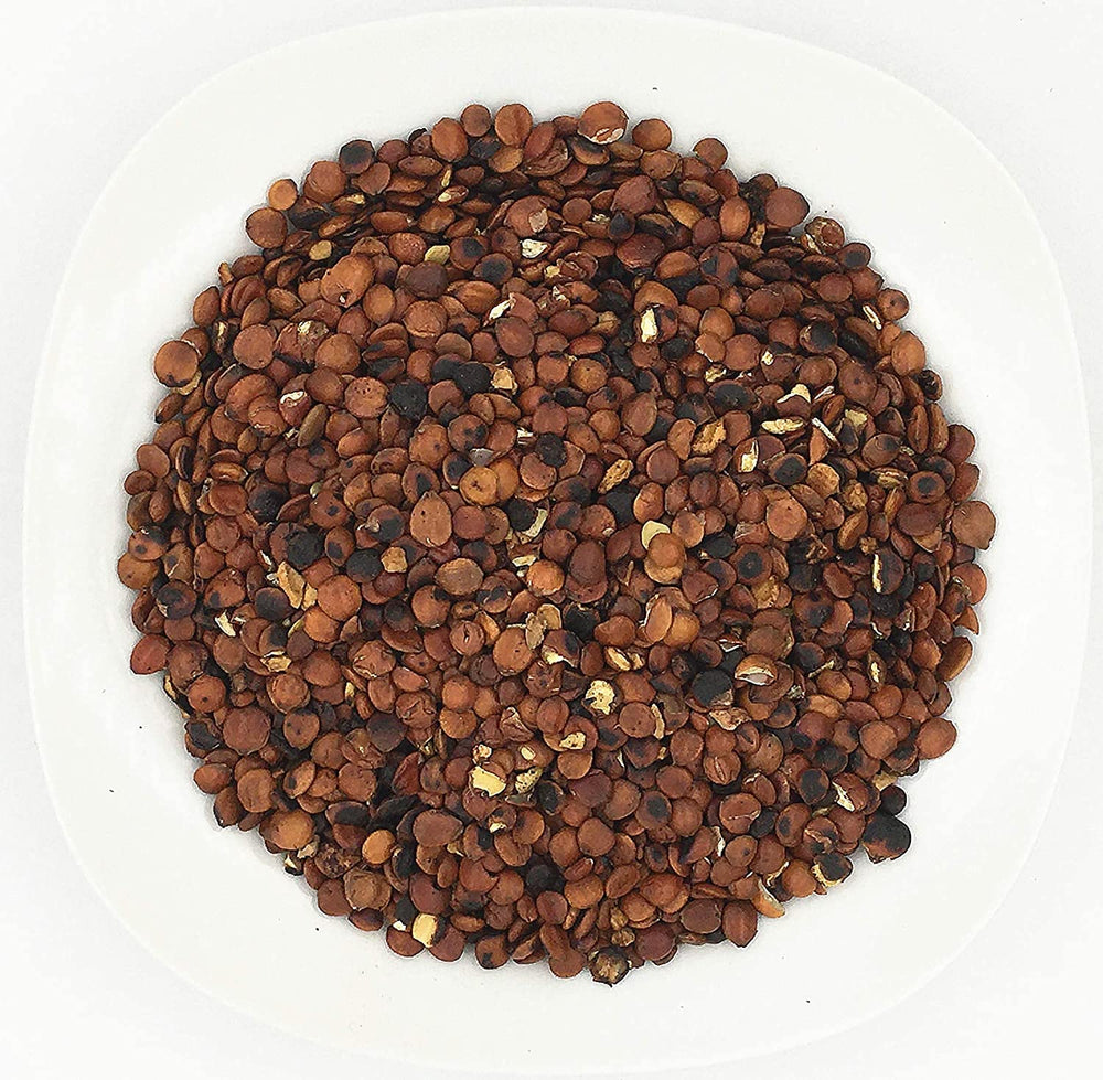 Greenlike fried Semen Zizyphi Spinosae Suan Zao Ren close-up highlighting toasty aroma for tea