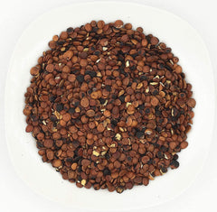 Greenlike fried Semen Zizyphi Spinosae Suan Zao Ren close-up highlighting toasty aroma for tea