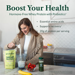 Greens First Dream Protein Whey scoop beside powder for a quick, protein-rich snack