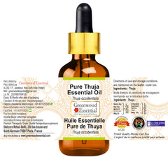 Greenwood Essential steam-distilled Thuja oil ready for skincare routines.