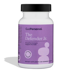 GutPersonal Defender bottle closeup showing capsules for daily immune support.
