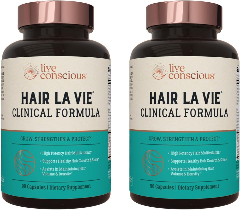 Hair La Vie Live Conscious bottle pouring capsules for daily hair support.