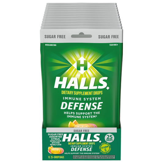 HALLS Defense vitamin C drops bottle with citrus flavor for daily immune support.