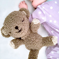 Happiest Baby SNOObear cry-activated feature calms fussies when crying.